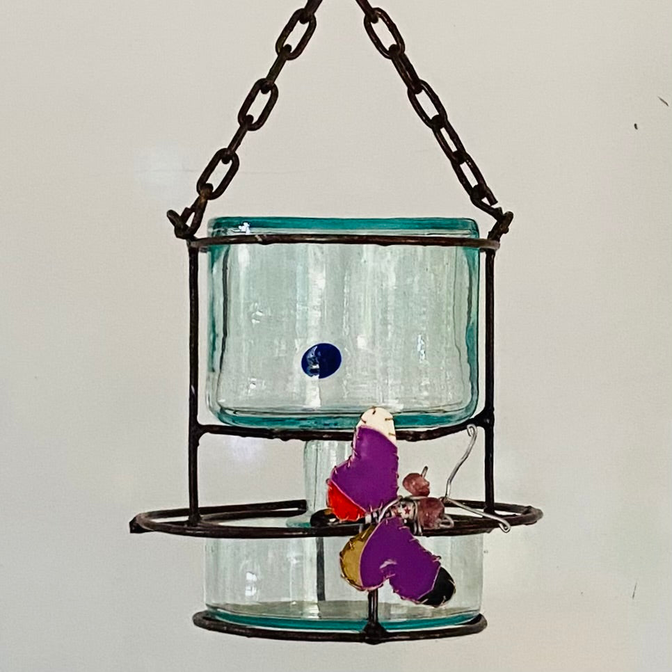 Blown glass - bottle in metal stand birdfeeder