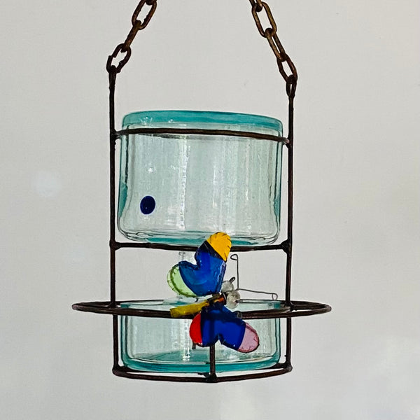 Blown glass - bottle in metal stand birdfeeder